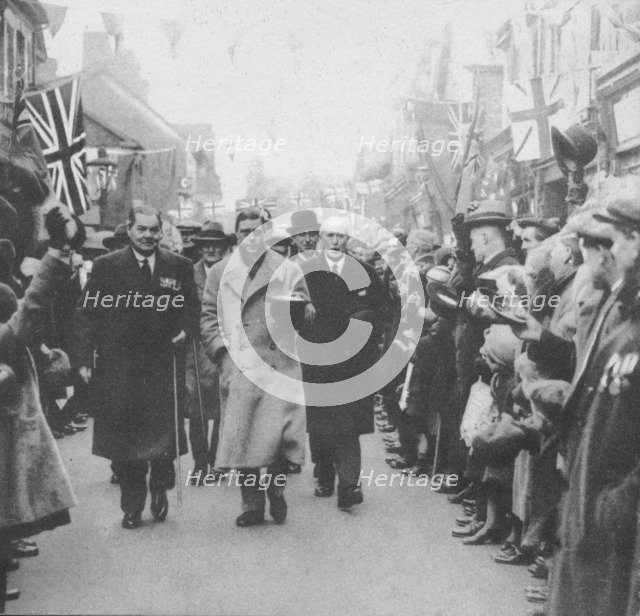 The Prince of Wales greeted by the people of Porth, Glamorgan, during a visit to Wales, 1932 (1936). Artist: Unknown.