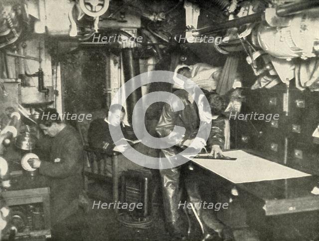 'At the Bottom of the Sea. In the wardroom of a submarine', (1919). Creator: Unknown.