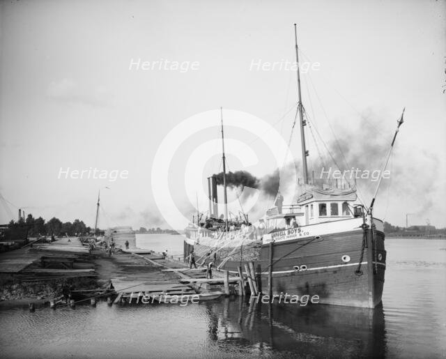 Unloading lumber, Saginaw, Mich., between 1900 and 1910. Creator: Unknown.