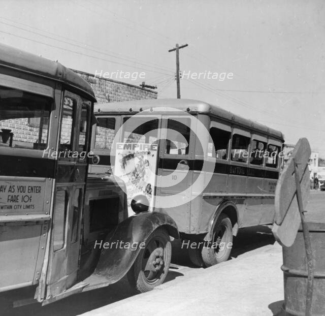Buses operated by the city which are used only by Negroes, Daytona Beach, Florida, 1943. Creator: Gordon Parks.
