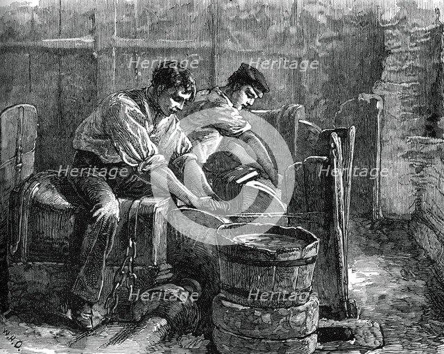 Grinders at work on a wheel, c1880. Artist: Unknown