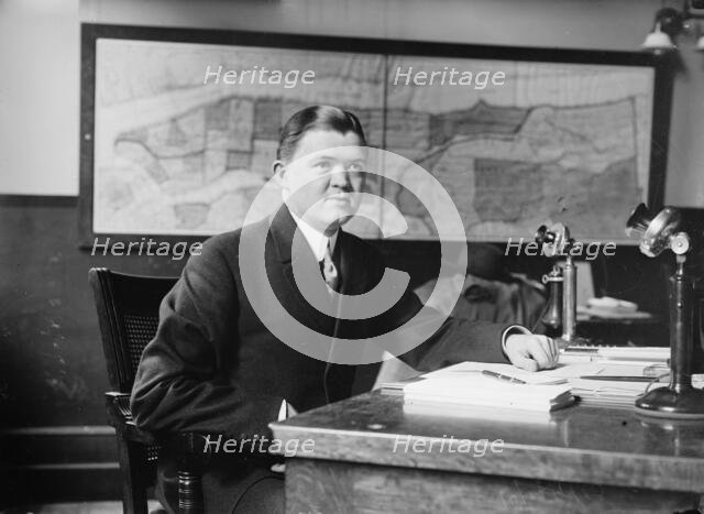 Clement Driscoll seated at desk, 1910. Creator: Bain News Service.