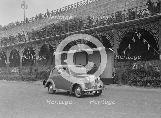 Vauxhall 10 of Miss IM Burton at the RAC Rally, Madeira Drive, Brighton, 1939. Artist: Bill Brunell.