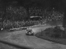 Unidentified car with supercharger competing in the Shelsley Walsh Hillclimb, Worcestershire, 1935. Artist: Bill Brunell.