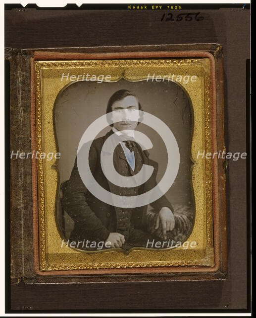 Unidentified man, three-quarters length portrait, ca. 1855. Creator: Francis Grice.