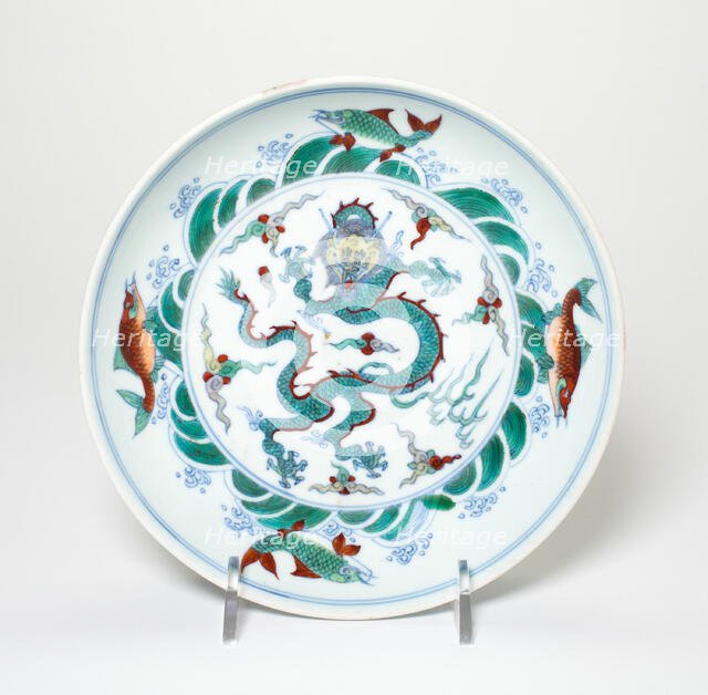 Dish with Dragon amid Flames Encircled by Fish amid Waves, Qing dynasty, 18th/19th century. Creator: Unknown.