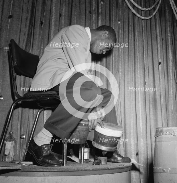 Portrait of Jose Mangual, Glen Island Casino, New York, N.Y., ca. July 1947. Creator: William Paul Gottlieb.