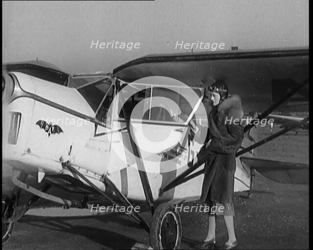 The Female Actor Ursula Jeans Climbing Into Her De Havilland Moth and Taking Off, 1929. Creator: British Pathe Ltd.