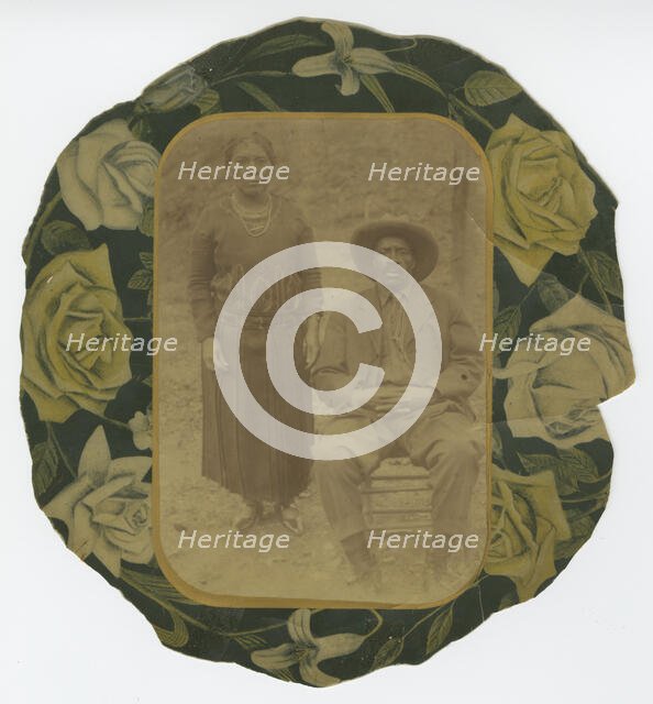 Photographic portrait of a man and woman on floral paper backing, early 20th century. Creator: Unknown.