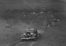 Ford V8 competing in the London Motor Club Coventry Cup Trial, Knatts Hill, Kent, 1938. Artist: Bill Brunell.