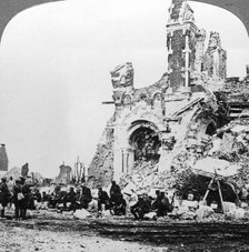 German prisoners of war beside the ruins of the basilica of Albert, France, World War I, 1914-1918.Artist: Realistic Travels Publishers