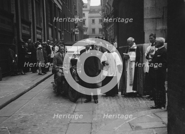 600 cc Douglas motorcycle combination at a motor vehicle blessing ceremony. Artist: Bill Brunell.