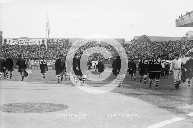 New York Giants walk onto the field at the Polo Grounds New York prior to Game One of the 1912.... Creator: Bain News Service.