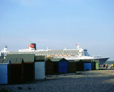 Queen Mary II sails past Beach Huts, Calshot May 2004. Artist: Unknown.