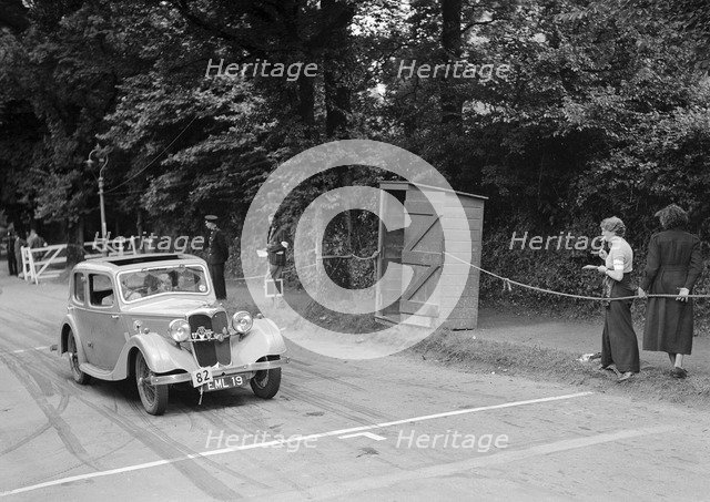 Riley of JM Laing, winner of a bronze award at the MCC Torquay Rally, July 1937. Artist: Bill Brunell.