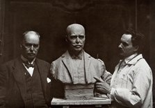 Sir Ronald Ross standing next to a bust of himself, and Janko Bragovitch (sculptor), 1926. Creator: Grove, Son and Boulton.