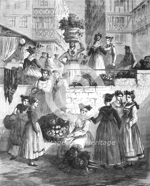 'Alsatian costumes seen in the market place of Strasburg; From Alsace to the Hartz', 1975. Creator: Unknown.