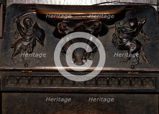 Detail of the choir ashlar work of the Cathedral of Barcelona, made in oak wood, 'Reliefs of Mercy'.