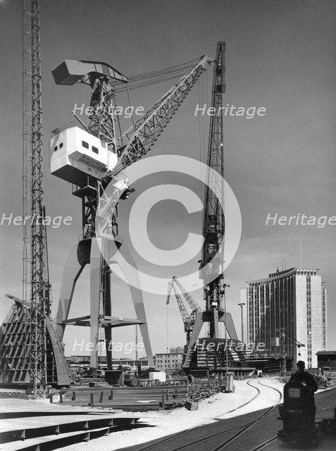 Cranes at Kockums shipyard, Malmö, Sweden, 1940s. Artist: Unknown