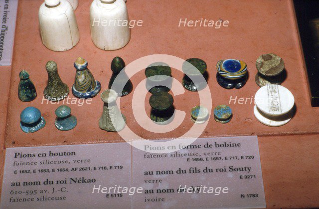 Faience, Glass and Ivory Playing Pieces from Egyptian Tombs, circa 1500 BC. Artist: Unknown.