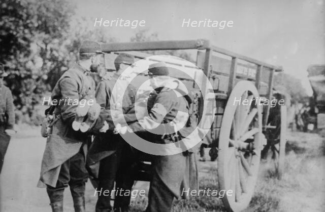French pick up dead near Charleroi, 21 Oct 1914. Creator: Bain News Service.