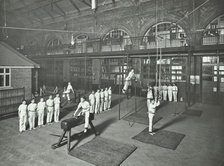 Gymnastics by male students, School of Building, Brixton, London, 1914. Artist: Unknown.