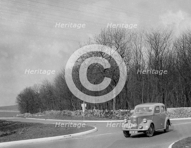 Ford of J McEvoy competing in the RAC Rally, 1939. Artist: Bill Brunell.