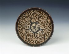 Jizhou bowl with stylised open flower, Yuan dynasty, China, late 13th-early 14th century. Artist: Unknown