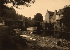 View of a stone bridge, river and buildings in a village, probably in France , c1890. Creator: Edgar Haincque de Saint-Senoch.