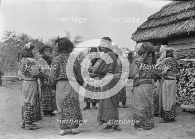 Crane dance of the Ainu women, 1908. Creator: Arnold Genthe.