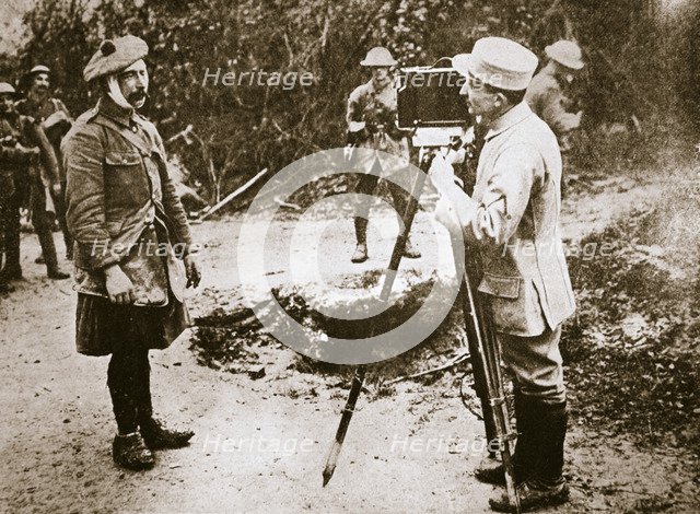 Cameraman filming a wounded soldier, Somme campaign, France, World War I, 1916. Artist: Unknown