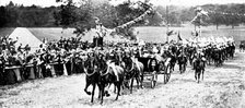 The Royal Review...in Worsley Park:...the arrival of the King and Queen..., 1909. Creator: Topical Press Agency.