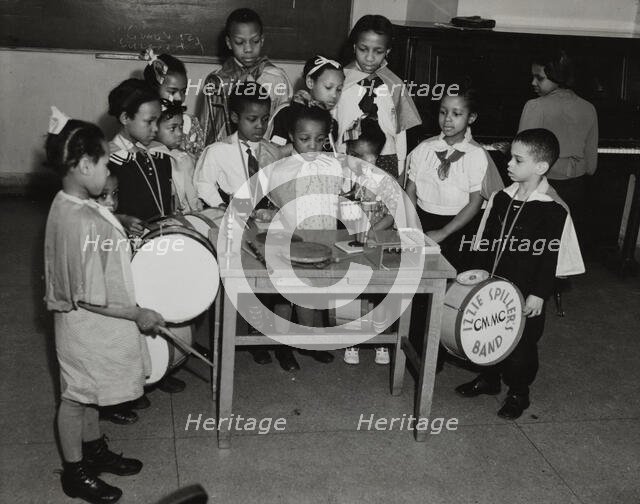 Drum students around a table, 1938. Creator: Unknown.