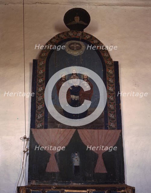An altar in the church dedicated to the Trinity, Trampas, N.M., 1943. Creator: John Collier.