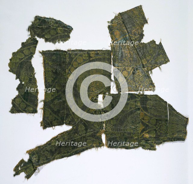 Fragments of a Caftan Covered with a Silk Fabric with a Senmurv Pattern. (Moshchevaya Balka Burial M Artist: Medieval Culture of the North Caucasian Silk Road  