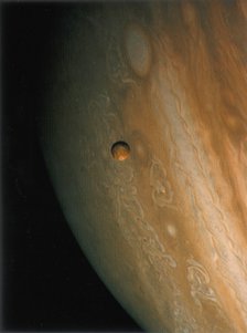 Jupiter and Io, one of its moons, 1979. Artist: Unknown