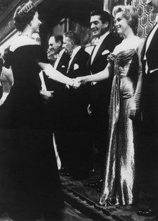 Marilyn Monroe meets Queen Elizabeth II at the Royal Film Show, October 1956.  Creator: Unknown.