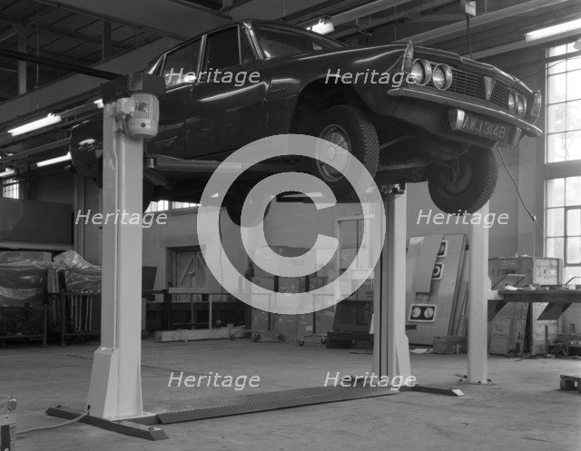 Rover P6 on a Laycock 4 post wheel free lift, Sheffield, South Yorkshire, 1968.  Artist: Michael Walters