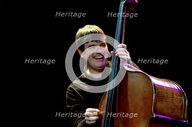 Andy Cleyndert, double bassist, The Under Ground, Eastbourne, East Sussex.  Artist: Brian O'Connor