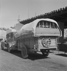 Migrant family stopped at the California-Arizona state line, Yuma, Arizona, 1937. Creator: Dorothea Lange.