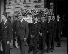 A Group of Mourners Including the Actor Douglas Fairbanks Attending the Funeral of Rudolph..., 1926. Creator: British Pathe Ltd.