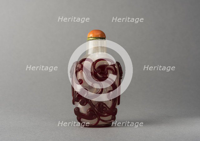 Clear glass snuff bottle with red overlay, China, Qing dynasty, 1644-1911. Creator: Unknown.