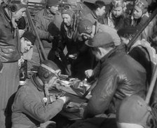 American Airmen Sitting and Eating in an Airfield, 1943-1944. Creator: British Pathe Ltd.