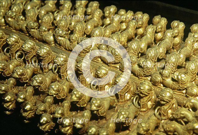 Gold chest late with zoomorphic round shaped, detail.