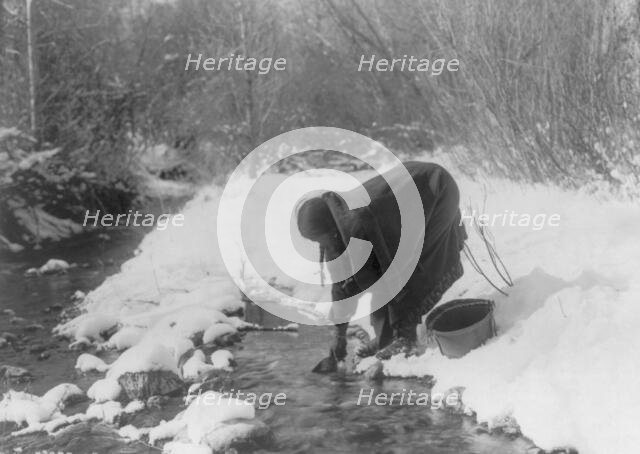 A winter day-Apsaroke, c1908. Creator: Edward Sheriff Curtis.
