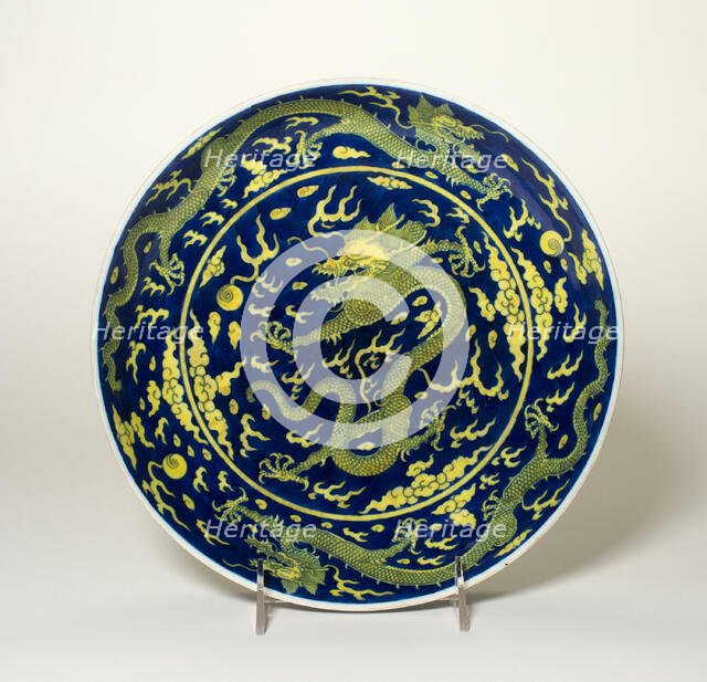 Blue-Ground Yellow-Enameled 'Dragon' Dish, Qing dynasty, Qianlong reign (1736-1795). Creator: Unknown.