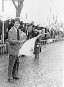 Carlo Masetti waving a flag. Artist: Unknown