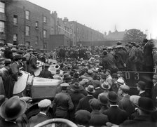 Car auction in Brixton Road, Brixton, London, 1919. Artist: Bedford Lemere and Company