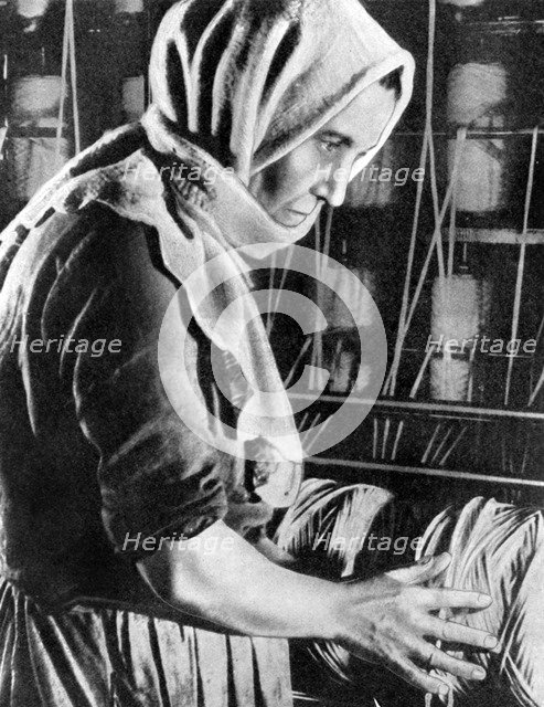 Female factory worker, Moscow, 1936. Artist: Unknown