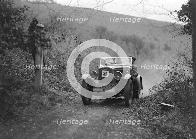 Wolseley Hornet of JM Suggs competing in the Inter-Varsity Trial, November 1931. Artist: Bill Brunell.